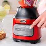Licuadora Oster Reversible 600W Vaso de Cristal 1.25L Motor Silencioso Rojo